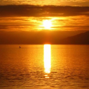 Sunset seen from a sea kayak off the coast of Knoydart.